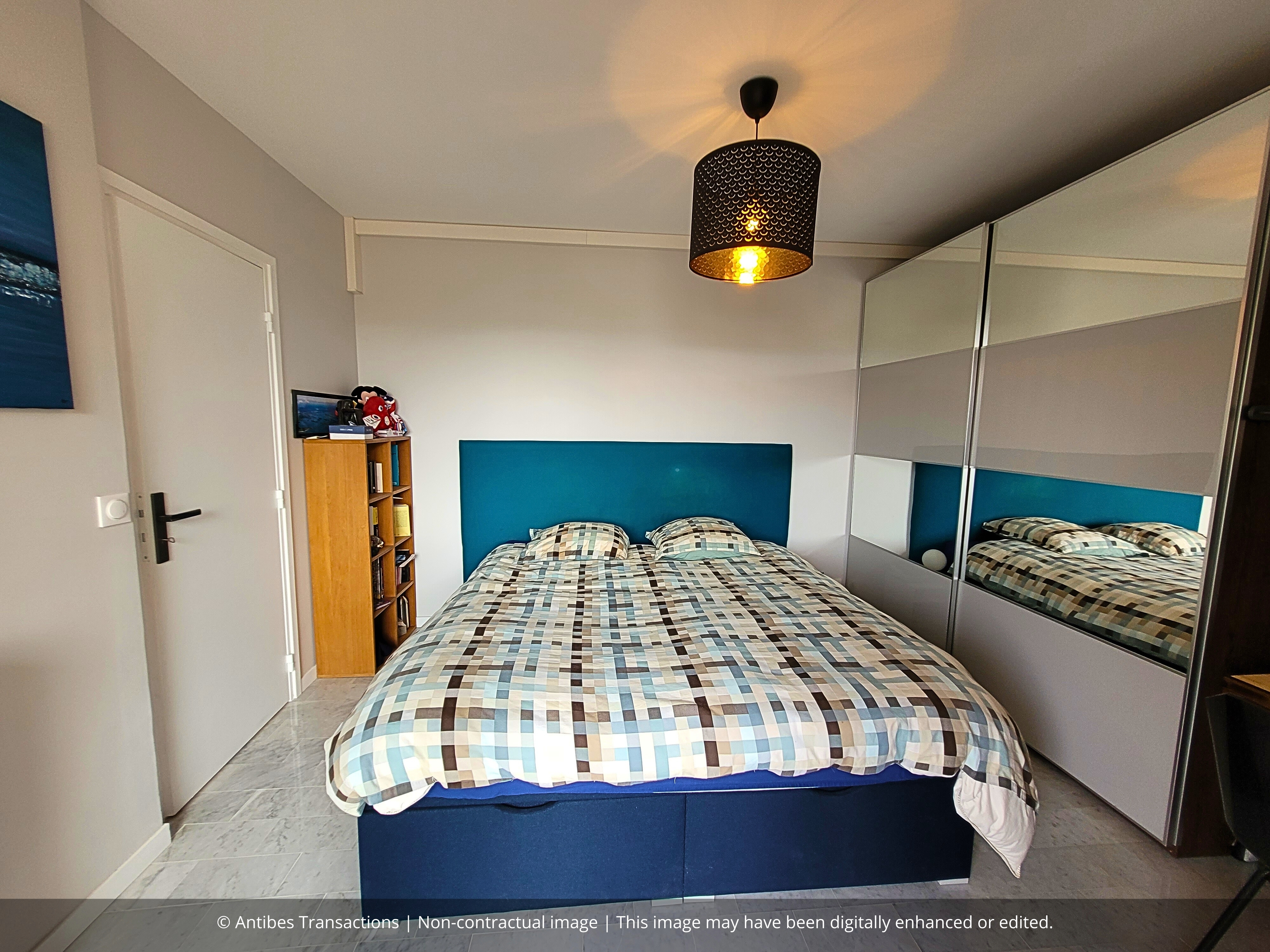 View of one of the apartment's two bedrooms
