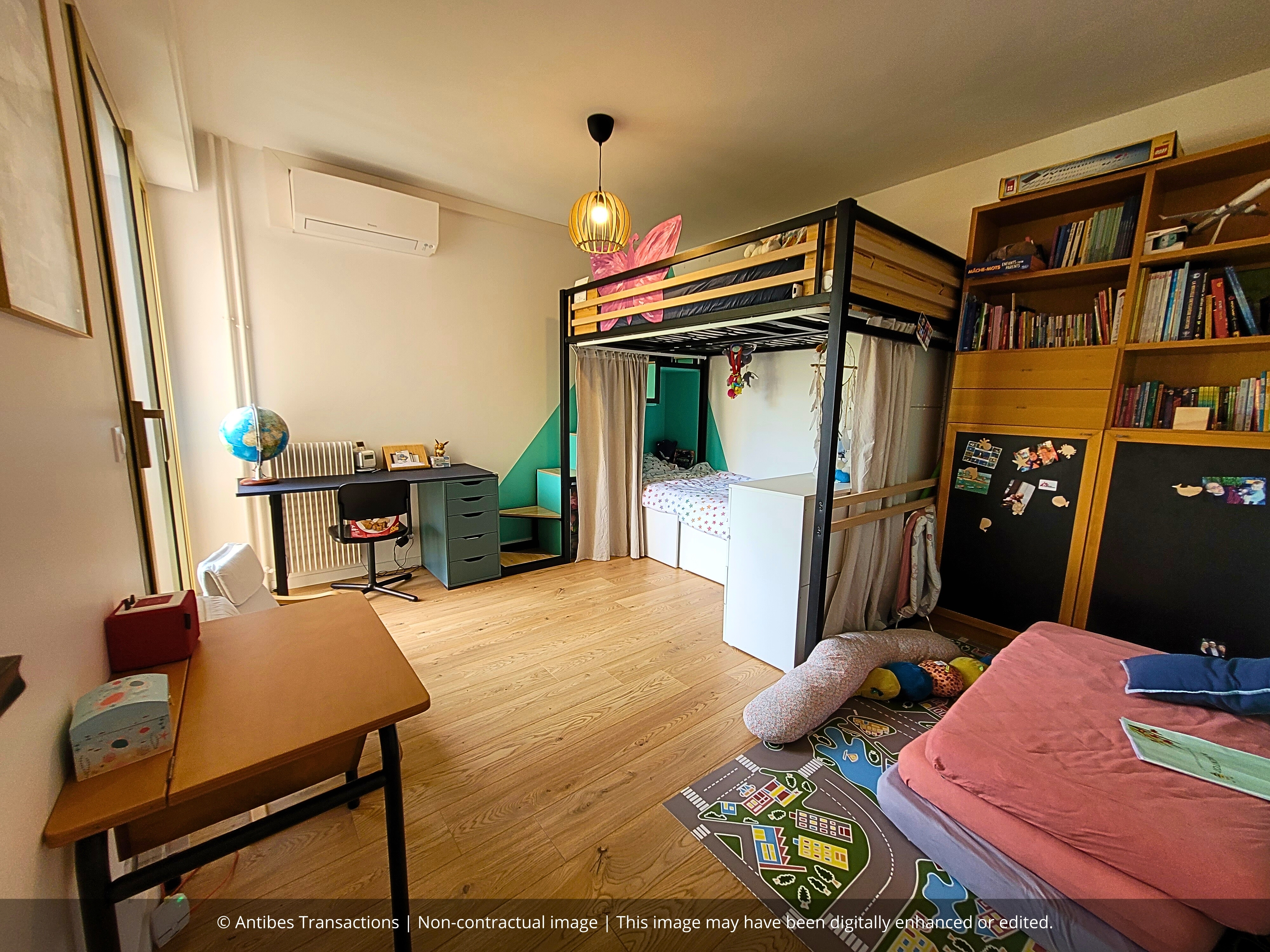 View of one of the apartment's two bedrooms