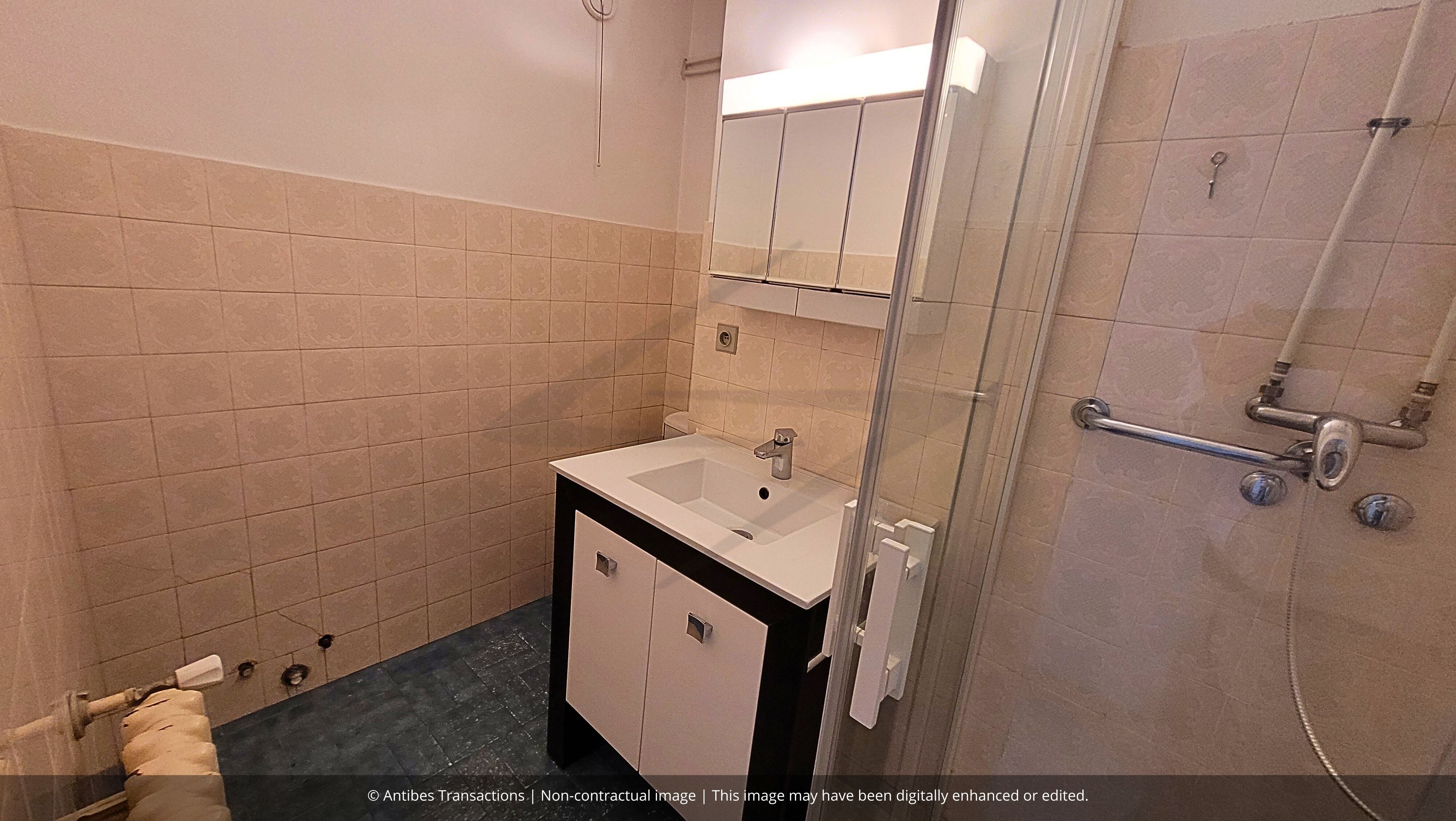 View of the shower room in the flat