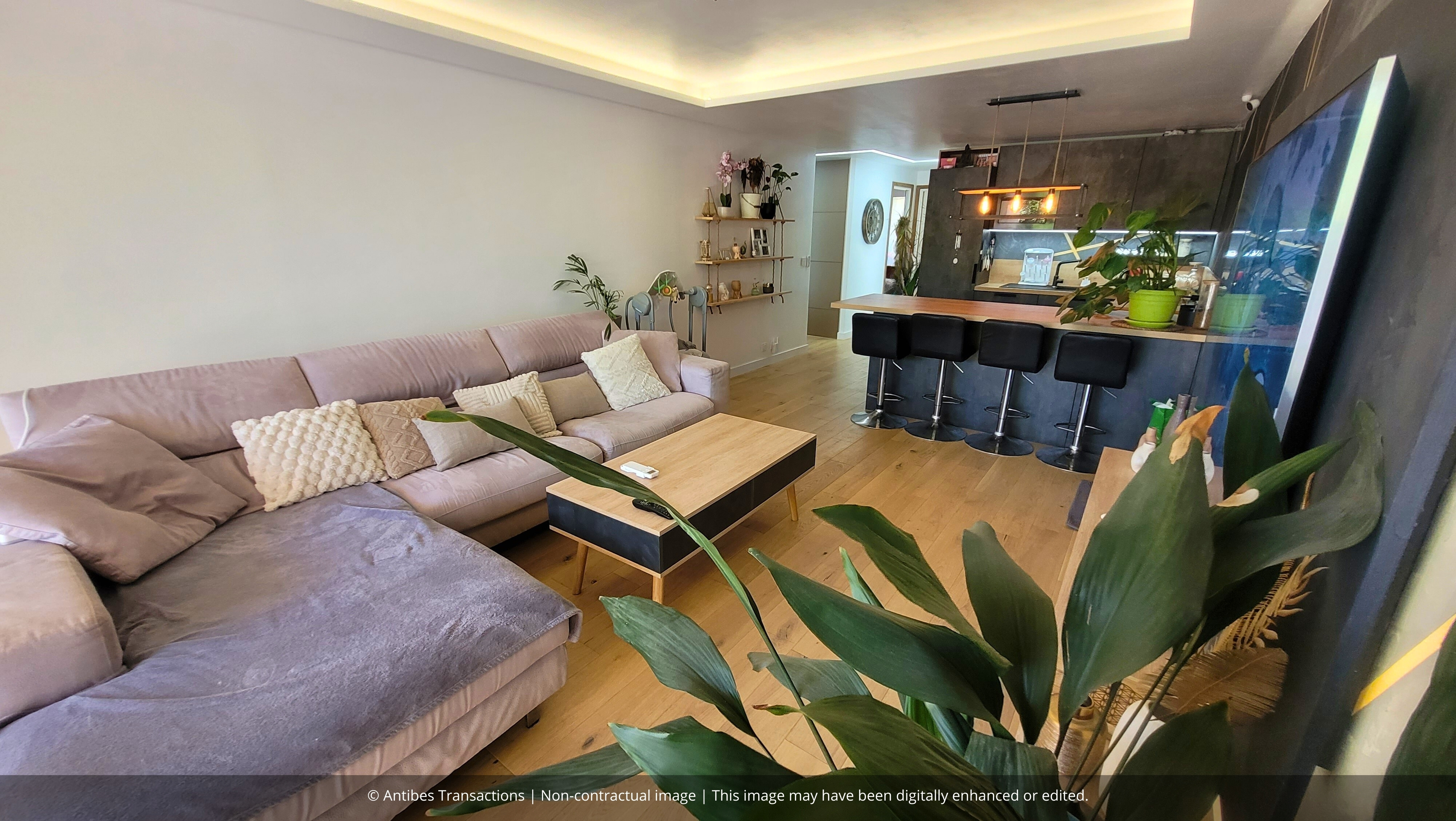 View of lounge and open-plan kitchen