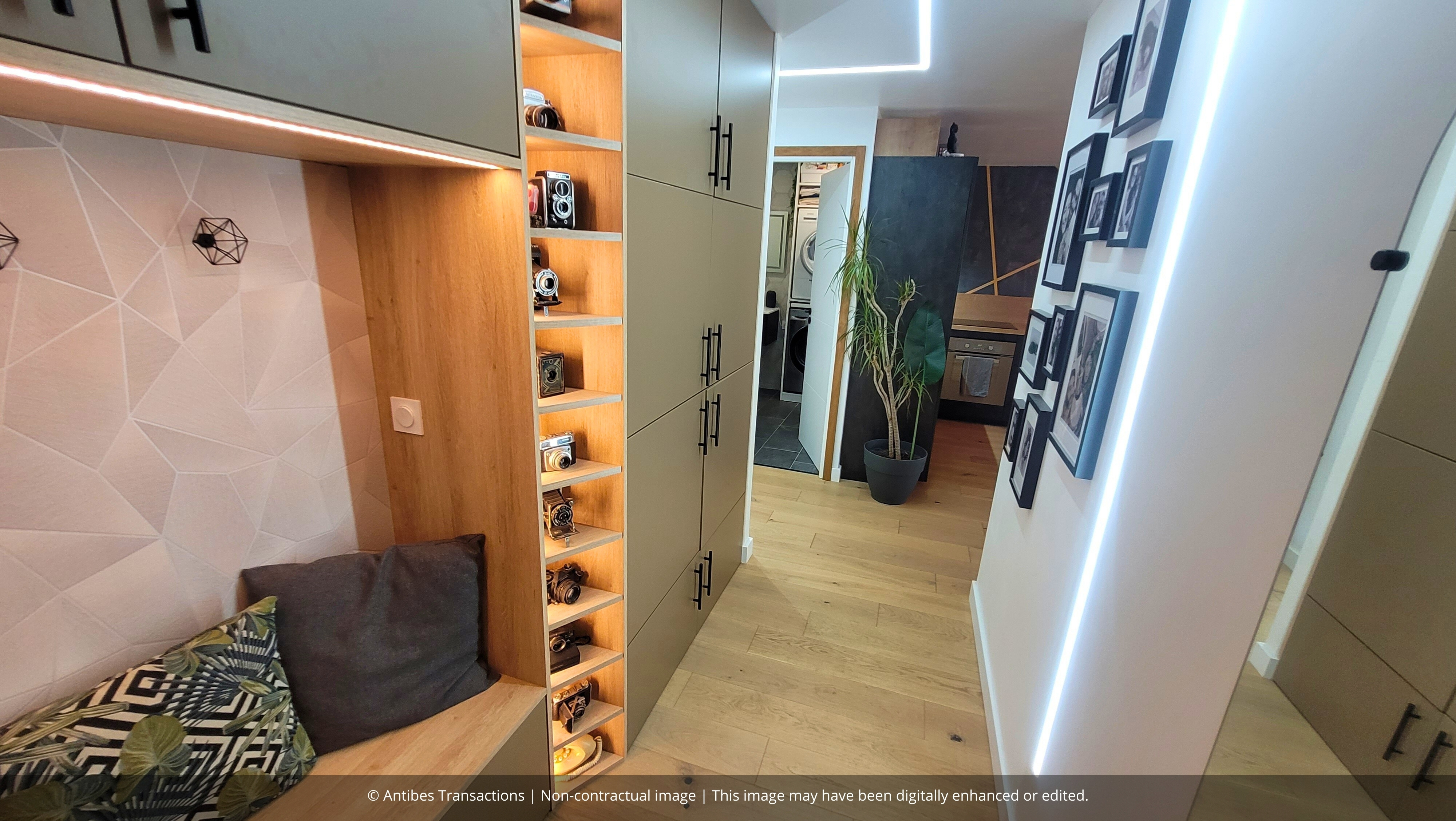 Hallway with storage and wall decoration