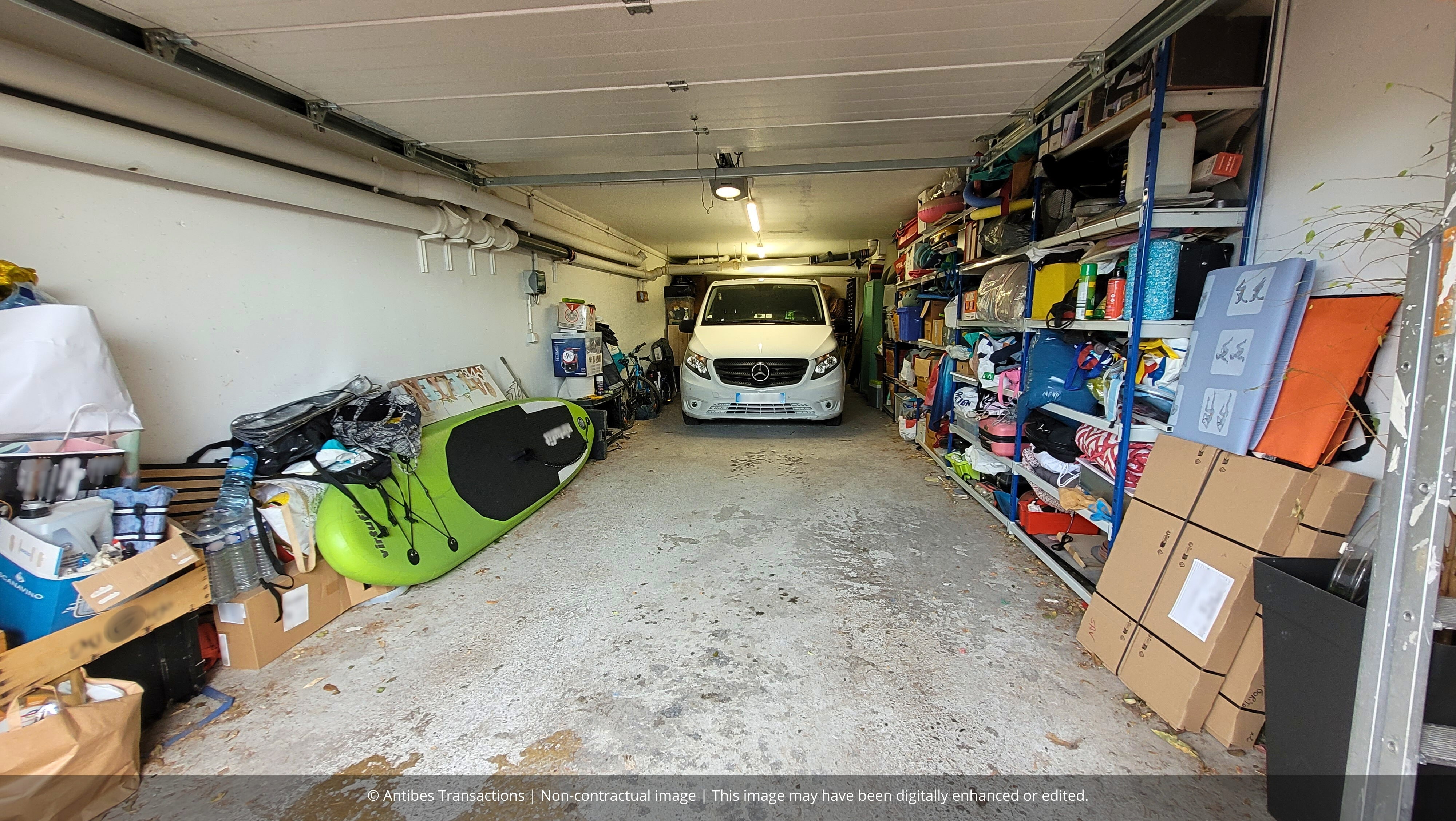 Tandem double garage with adjoining cellar