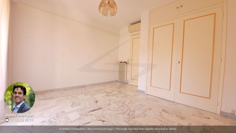 View of one of the three bedrooms