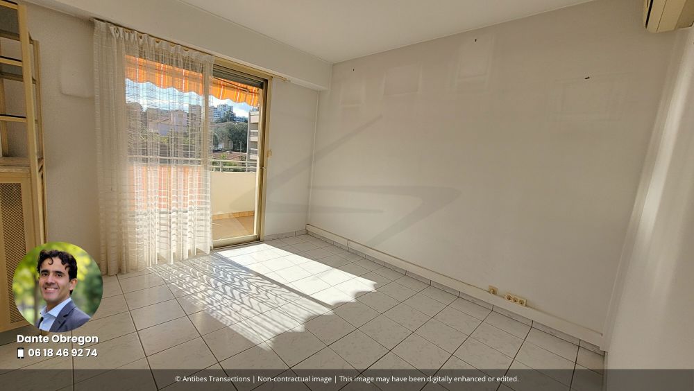 View of one of the three bedrooms