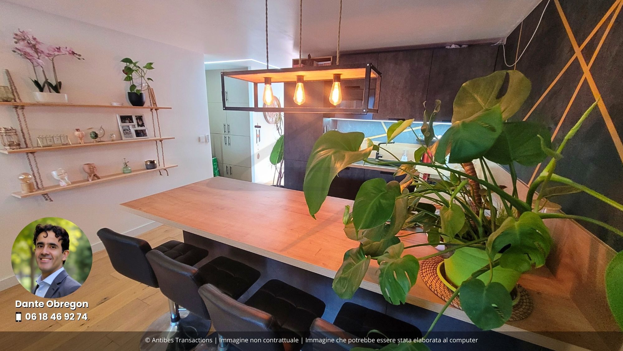 Cucina a vista moderna e attrezzata con zona pranzo