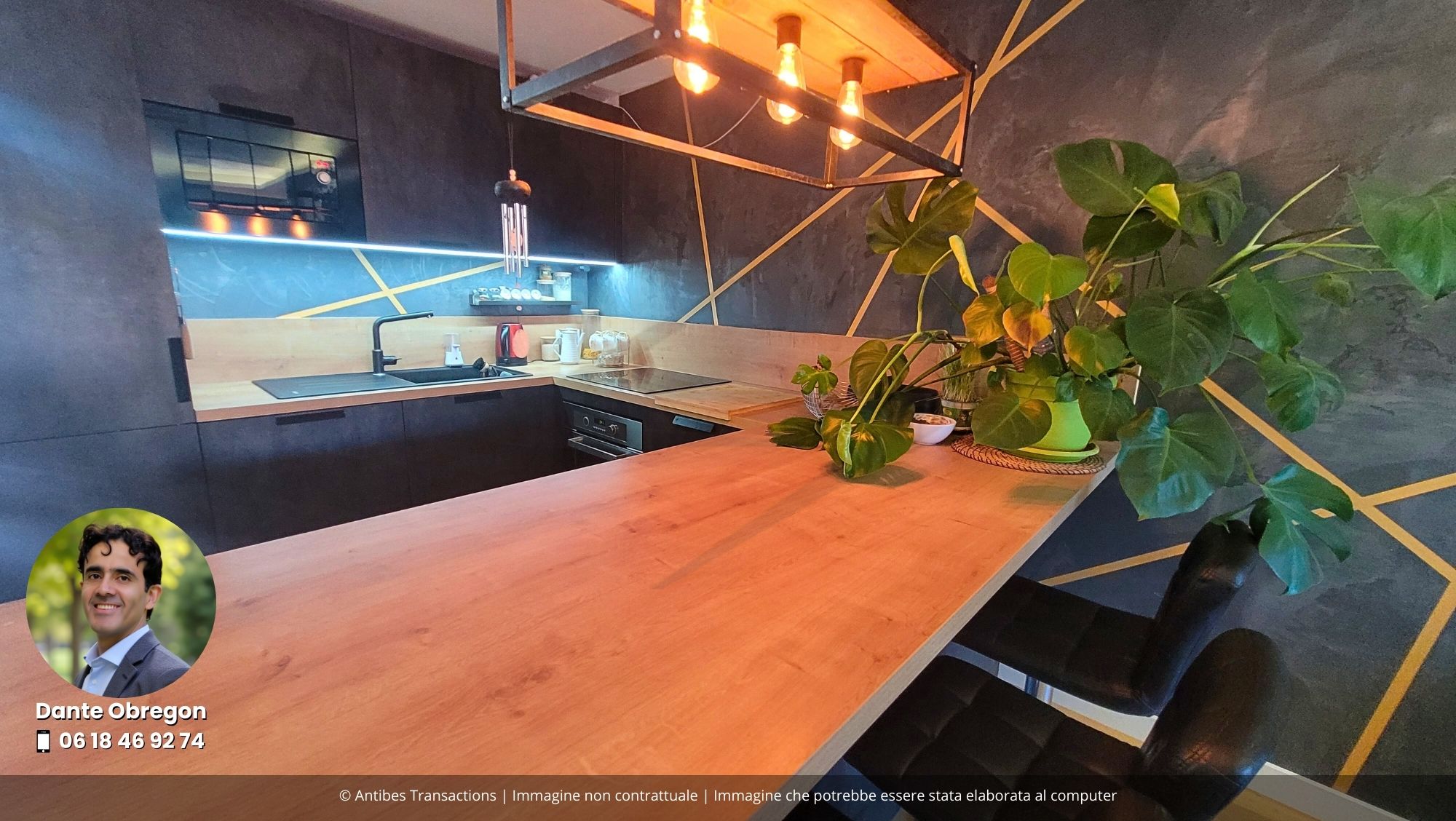 Cucina a vista moderna e attrezzata con zona pranzo